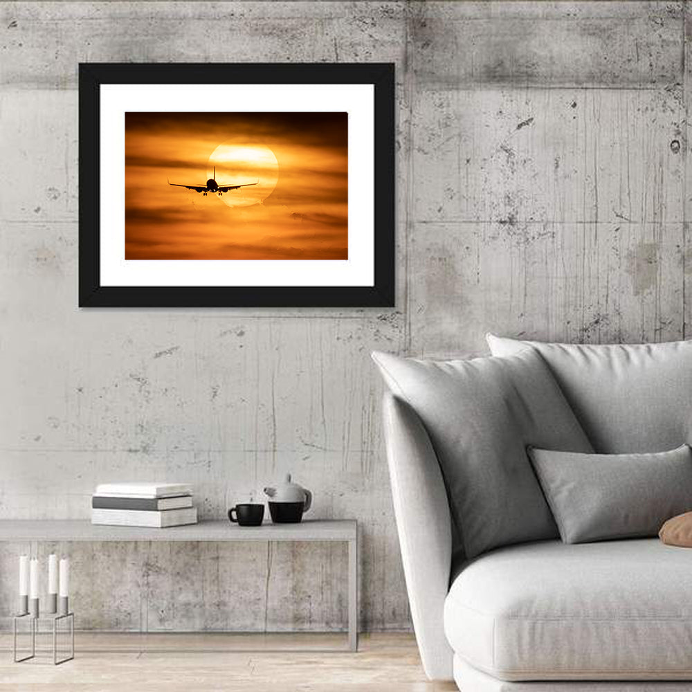 Airplane Silhouette at Golden Sunset Wall Art in a room, landscape