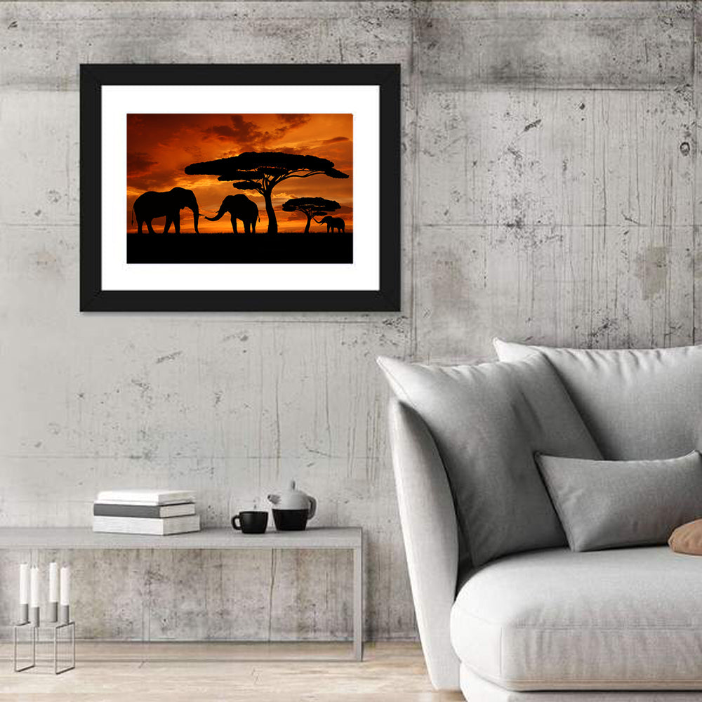 Three Elephants at Sunset Wall Art in a room, landscape