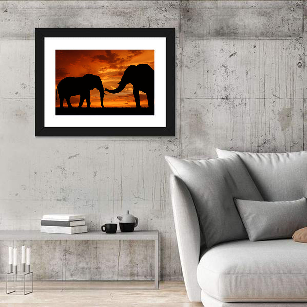 Elephants at Golden Sunset Wall Art in a room, landscape