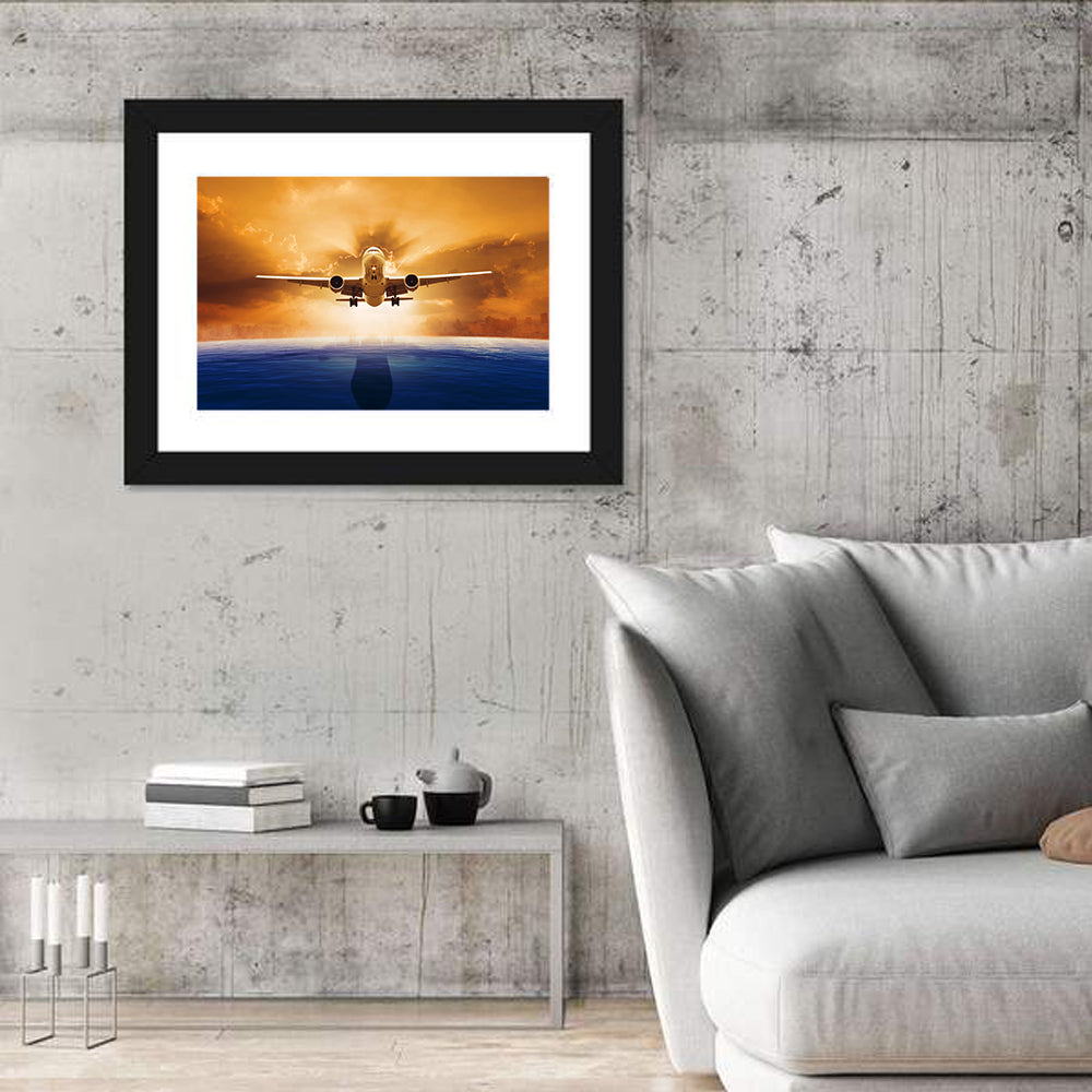 Landing Jet Over Ocean at Sunset Wall Art in a room, landscape
