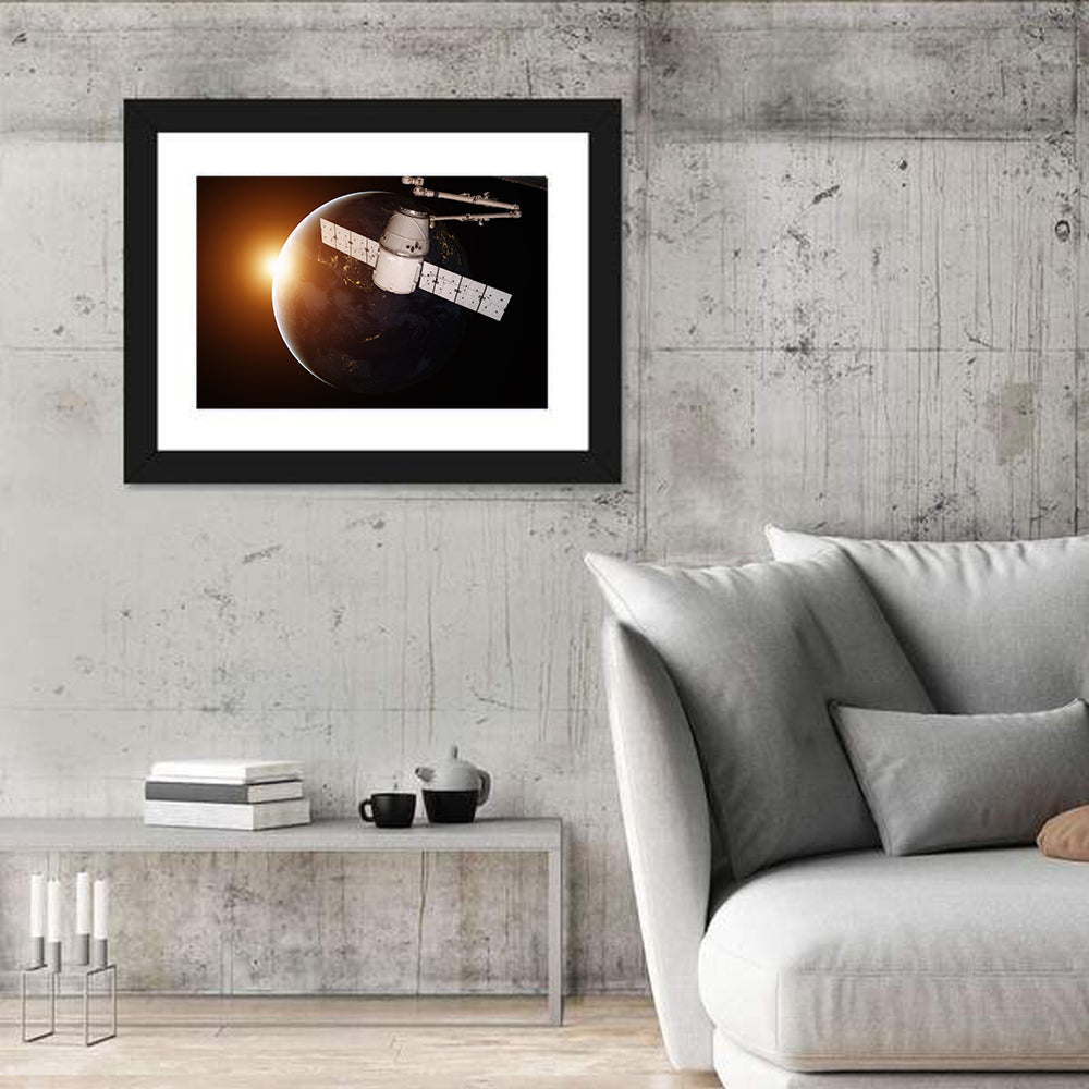 Satellite Over Earth at Sunrise Wall Art