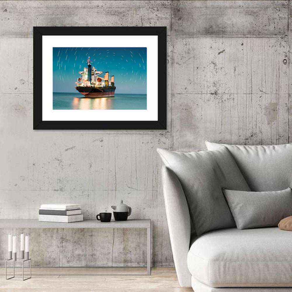 Cargo Ship Under Star Trail Sky Wall Art in a room, landscape