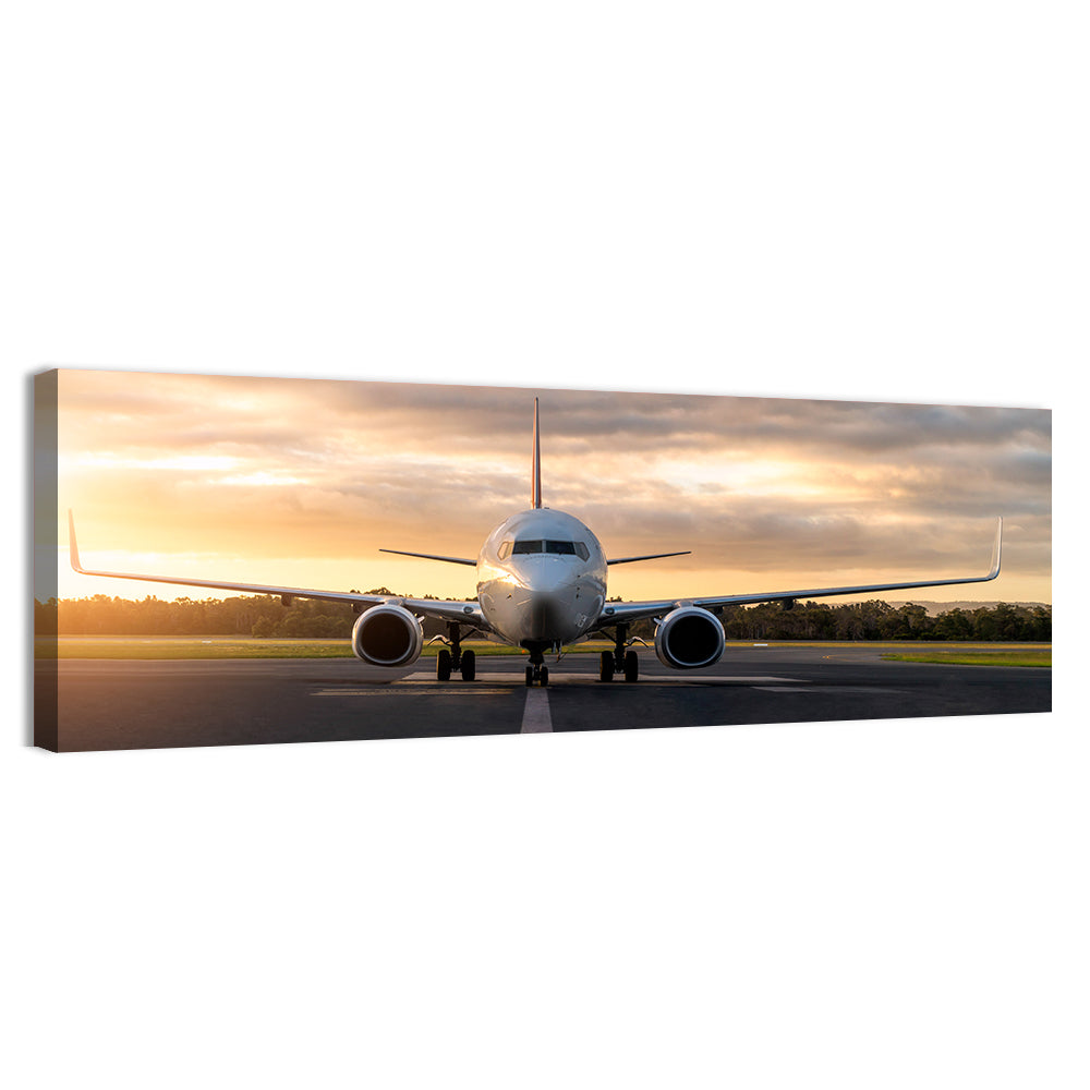 Front Facing Airplane on Runway at Sunset Wall Art