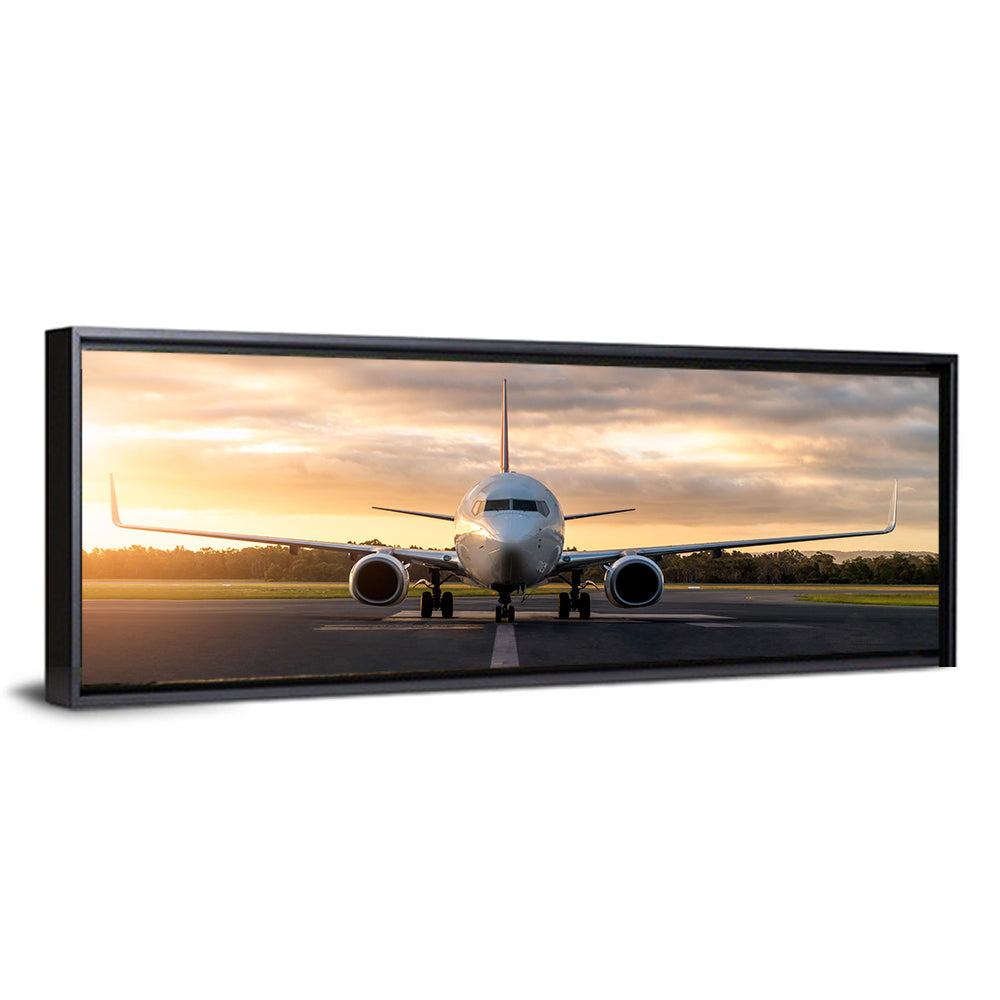 Front Facing Airplane on Runway at Sunset Wall Art