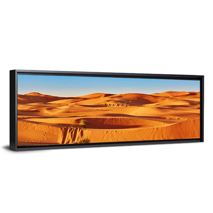 Sunlit Sahara Dunes with Camel Caravan Wall Art