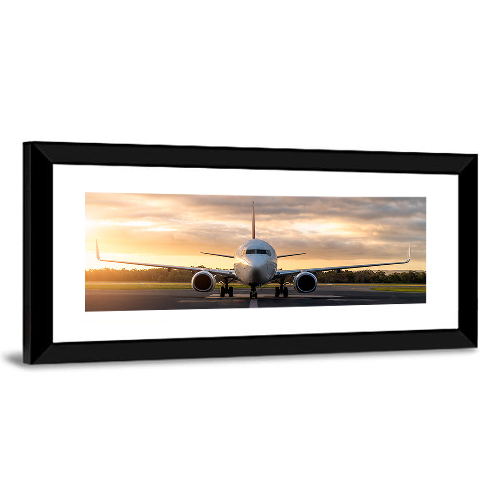 Front Facing Airplane on Runway at Sunset Wall Art
