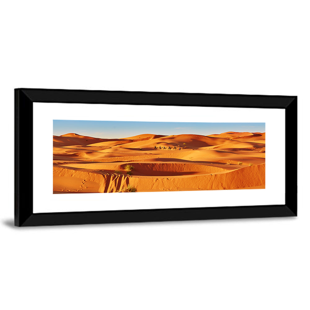 Sunlit Sahara Dunes with Camel Caravan Wall Art