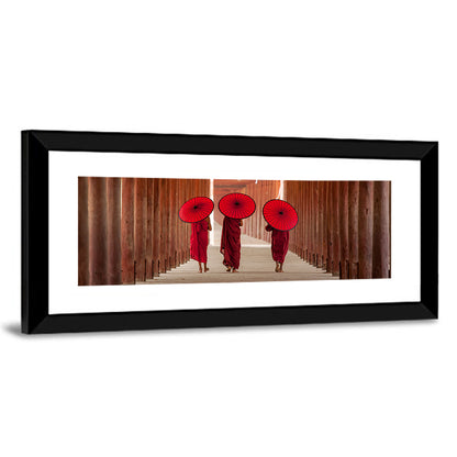 Novice Monks with Red Umbrellas Wall Art