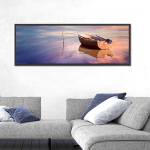 Lonely Boat At Sunset Wall Art