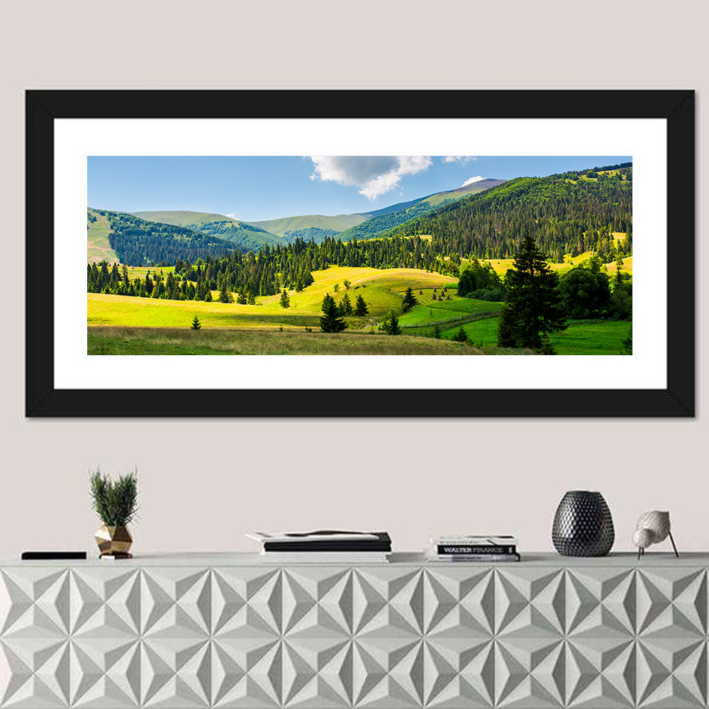 Sunlit Haystacks on Rolling Grassy Hills Wall Art