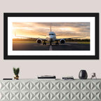Front Facing Airplane on Runway at Sunset Wall Art