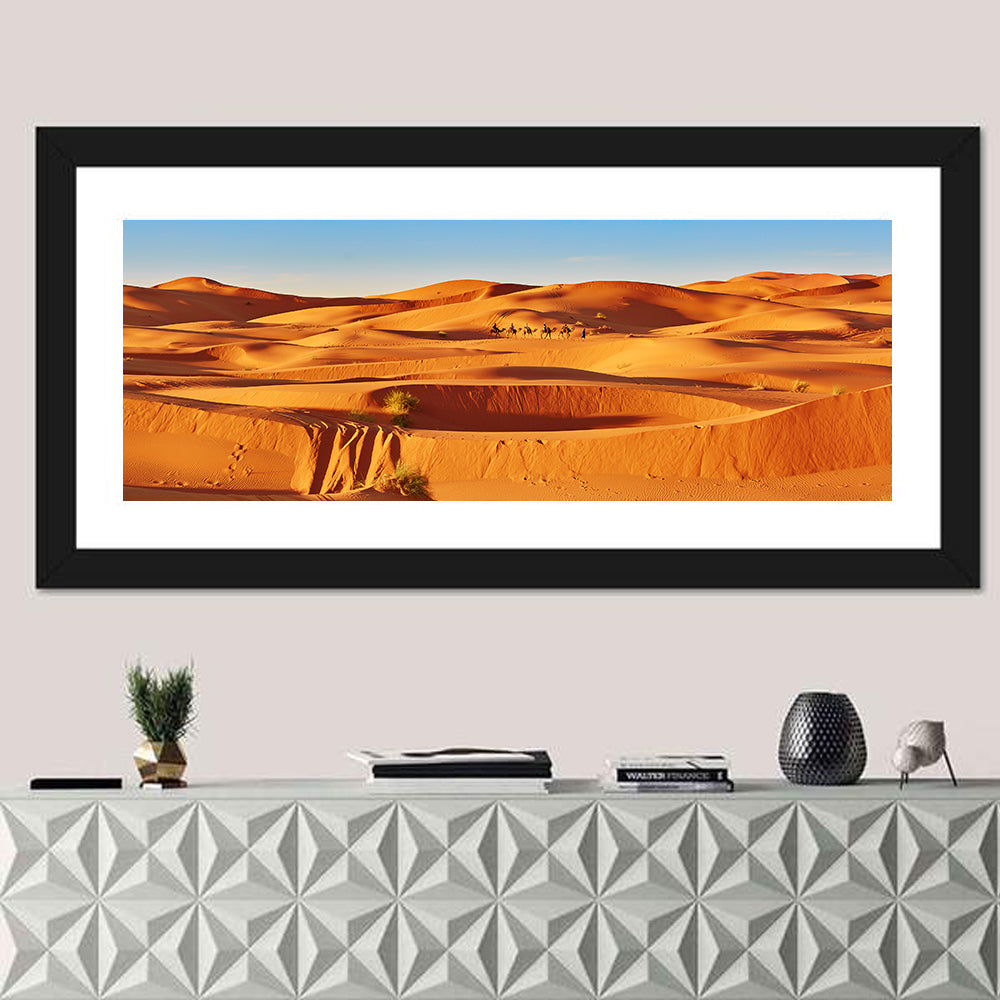 Sunlit Sahara Dunes with Camel Caravan Wall Art