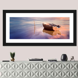 Lonely Boat At Sunset Wall Art