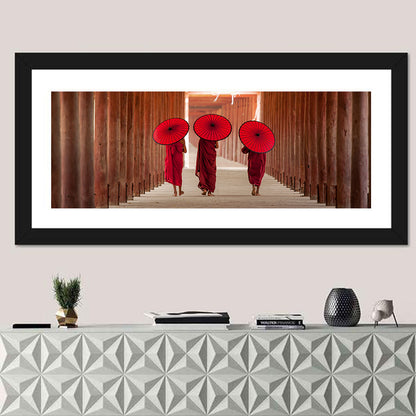 Novice Monks with Red Umbrellas Wall Art