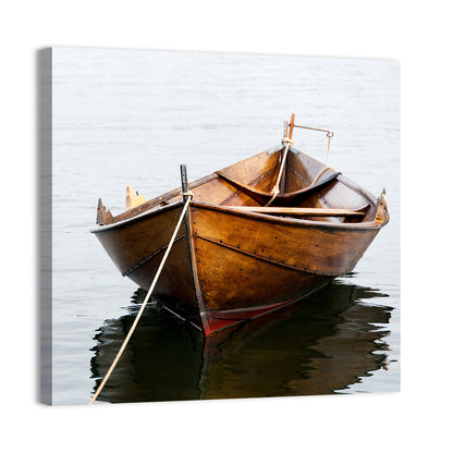 Tethered Wooden Rowboat on Calm Water Wall Art