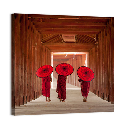 Novice Monks with Red Umbrellas Wall Art