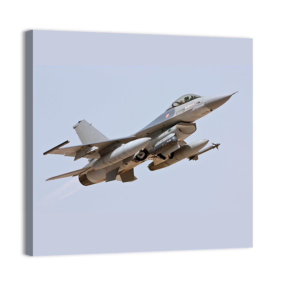 F-16 Fighter Jet Banking Over Sky Wall Art
