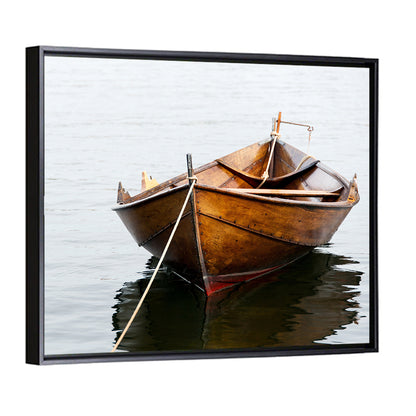 Tethered Wooden Rowboat on Calm Water Wall Art