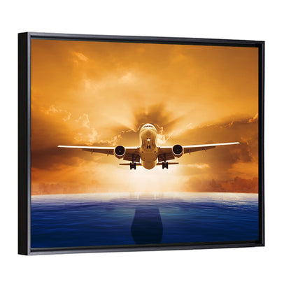 Landing Jet Over Ocean at Sunset Wall Art
