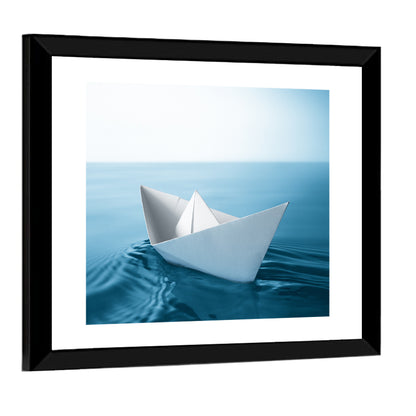 Paper Sailboat on Blue Water Wall Art