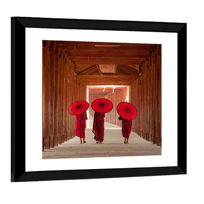 Novice Monks with Red Umbrellas Wall Art