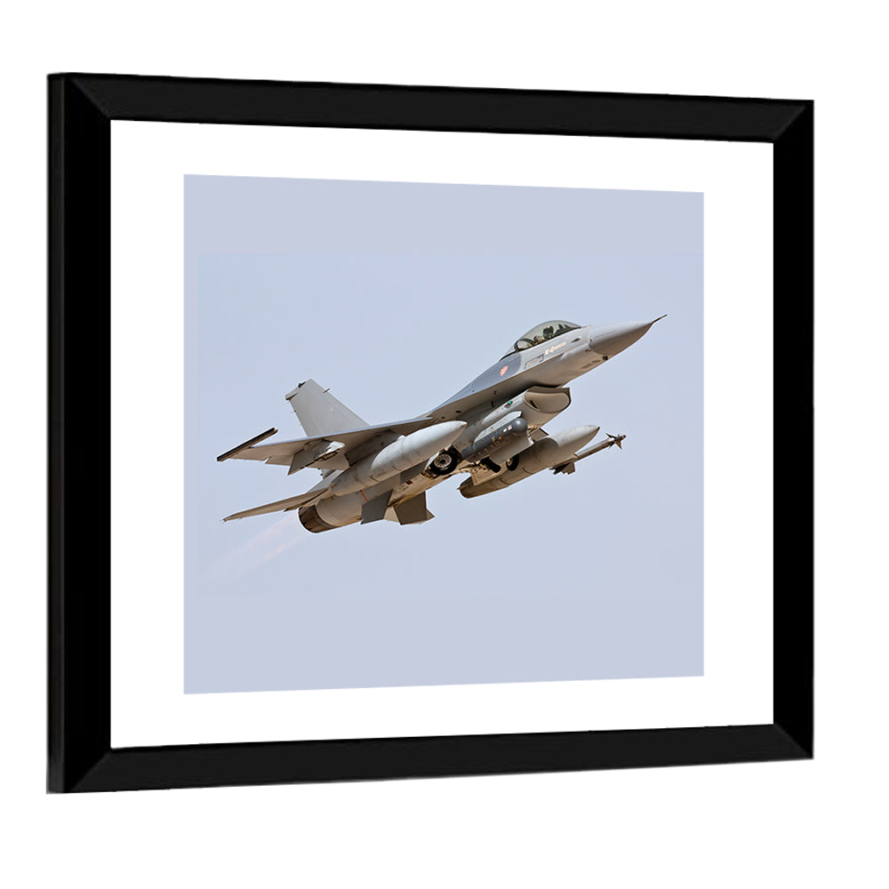 F-16 Fighter Jet Banking Over Sky Wall Art