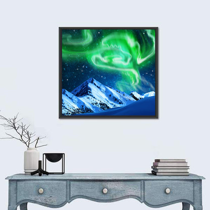 Glowing Aurora Over Snow Capped Mountains Wall Art