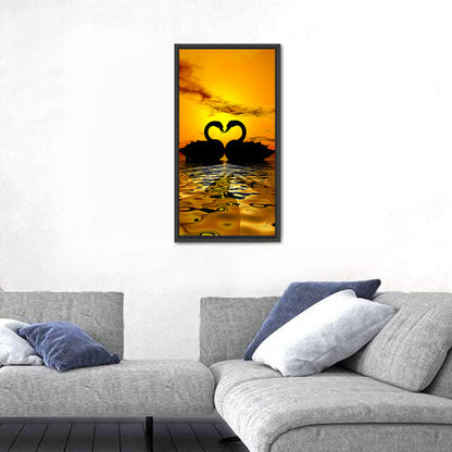 Swans Forming Heart at Sunset Wall Art
