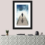 Man Ascending Toward Light Wall Art