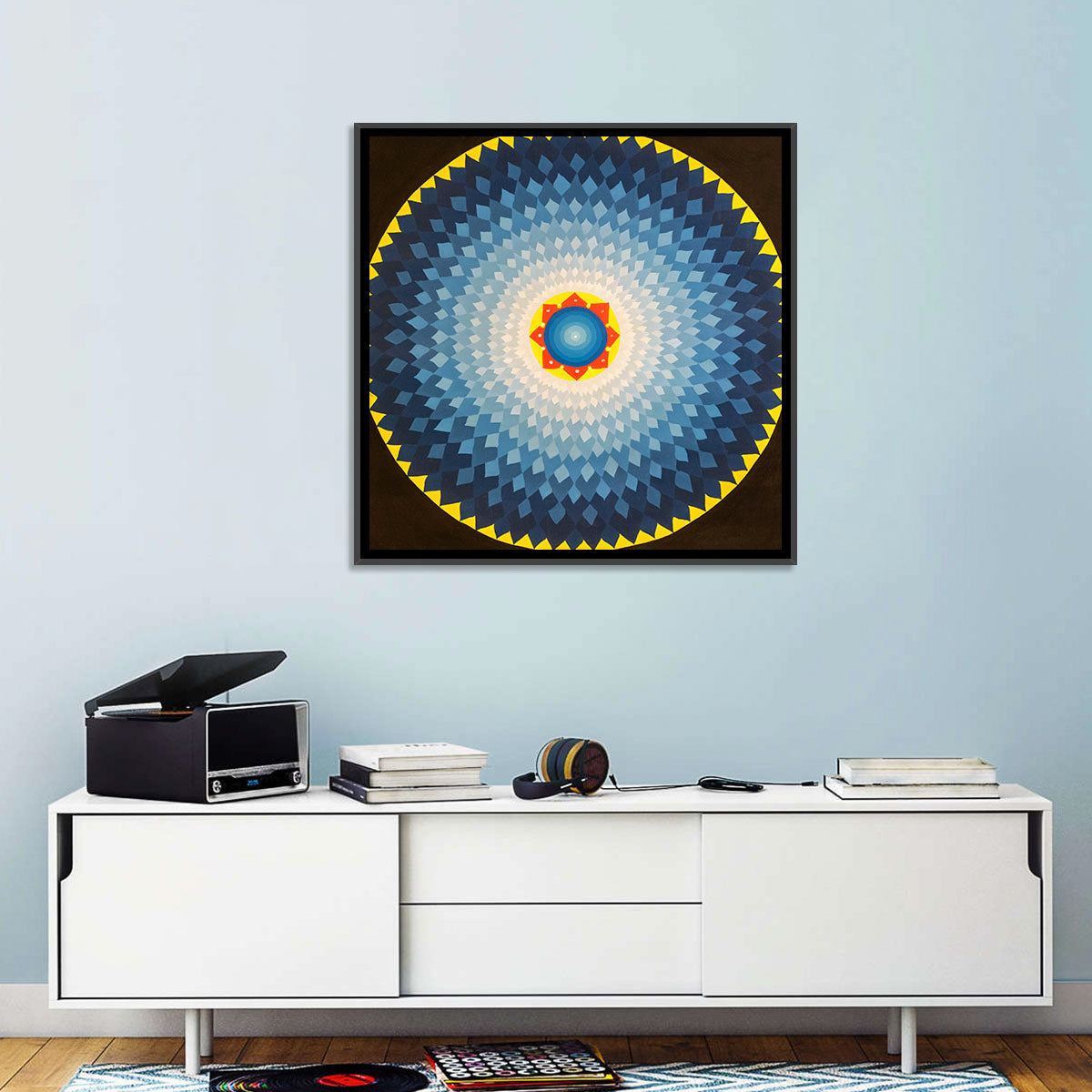Radiant Blue Sunburst Mandala Wall Art in a room, square