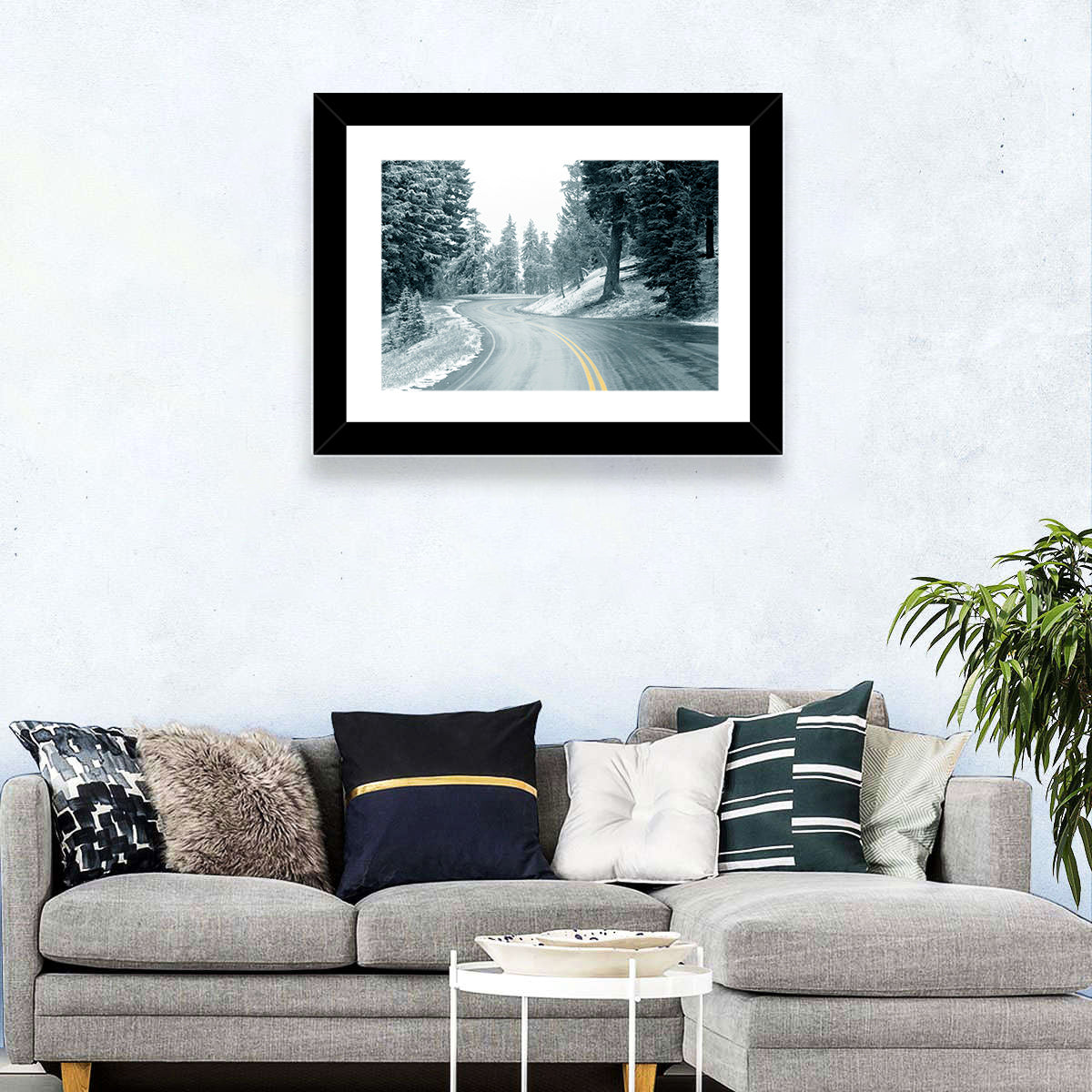 Winding Snowy Highway Wall Art in a room, landscape