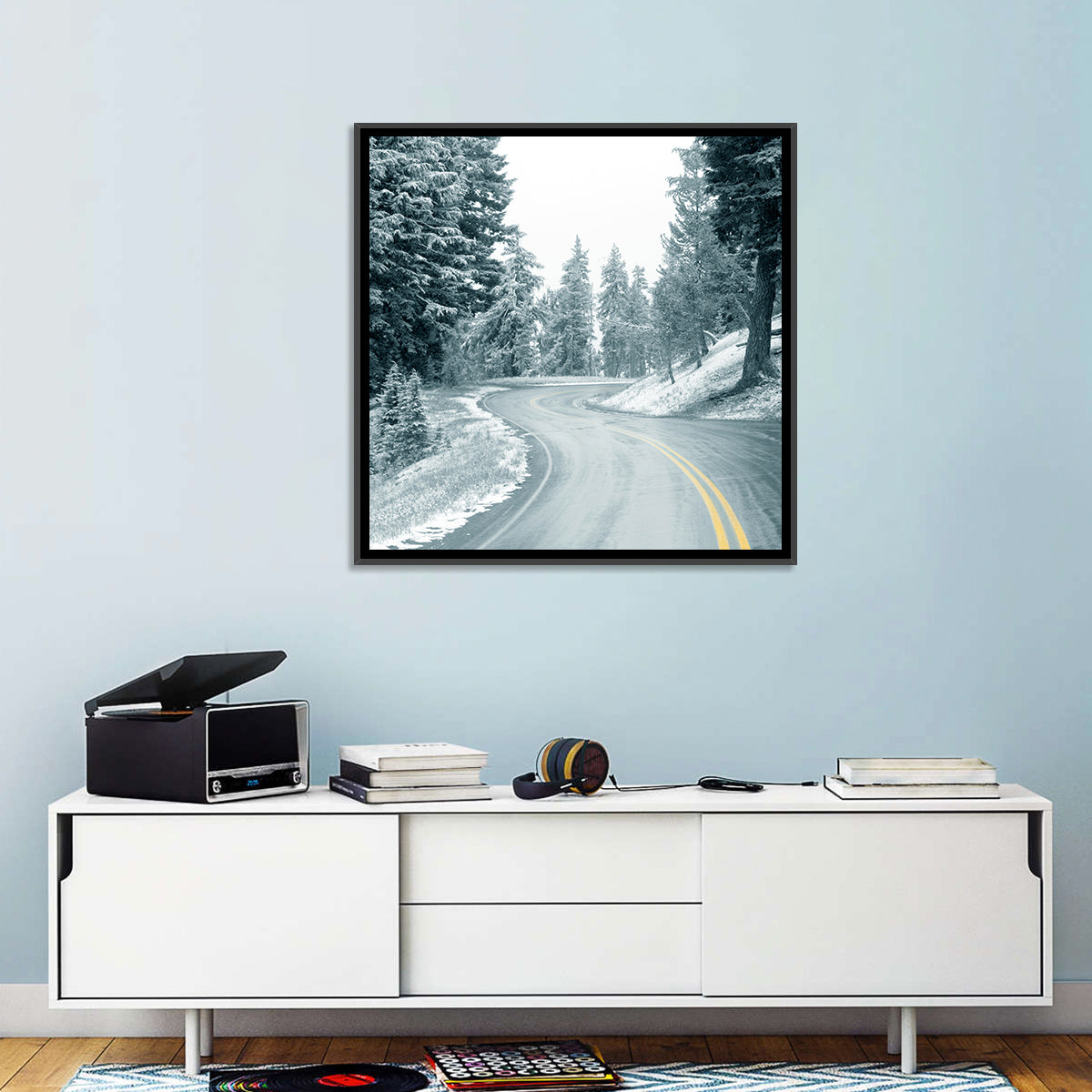 Winding Snowy Highway Wall Art in a room, landscape
