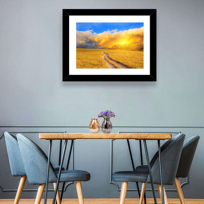 Sunlit Meadow Path with Dramatic Clouds Wall Art
