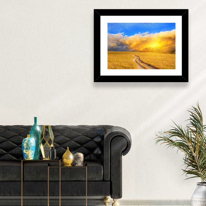 Sunlit Meadow Path with Dramatic Clouds Wall Art