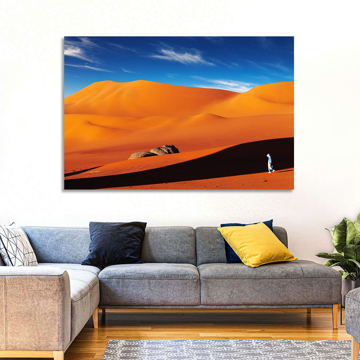 Solitary Figure on Sahara Dunes Wall Art in a room, landscape