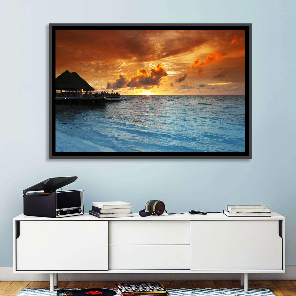 Overwater Bungalow Sunset Pier Wall Art in a room, landscape