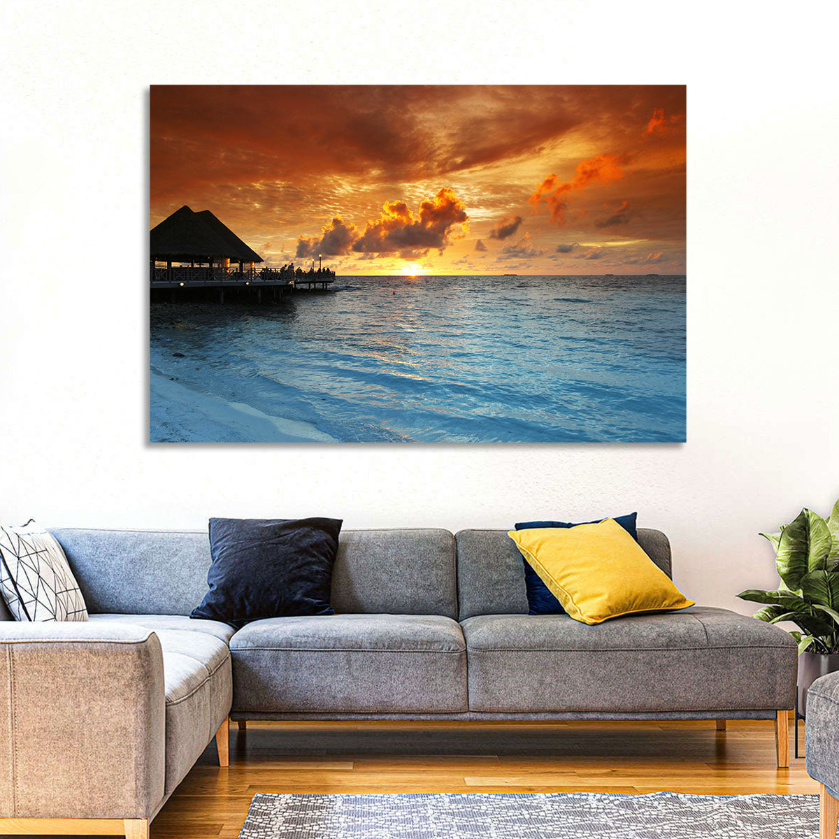 Overwater Bungalow Sunset Pier Wall Art in a room, landscape