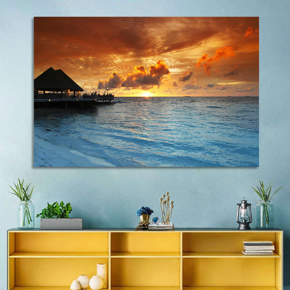 Overwater Bungalow Sunset Pier Wall Art in a room, landscape