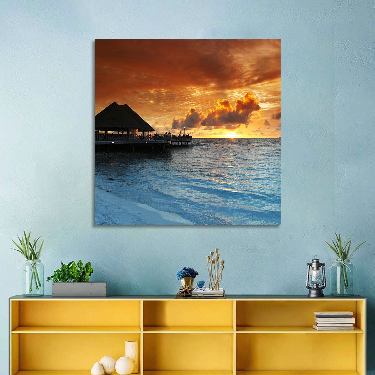 Overwater Bungalow Sunset Pier Wall Art in a room, landscape