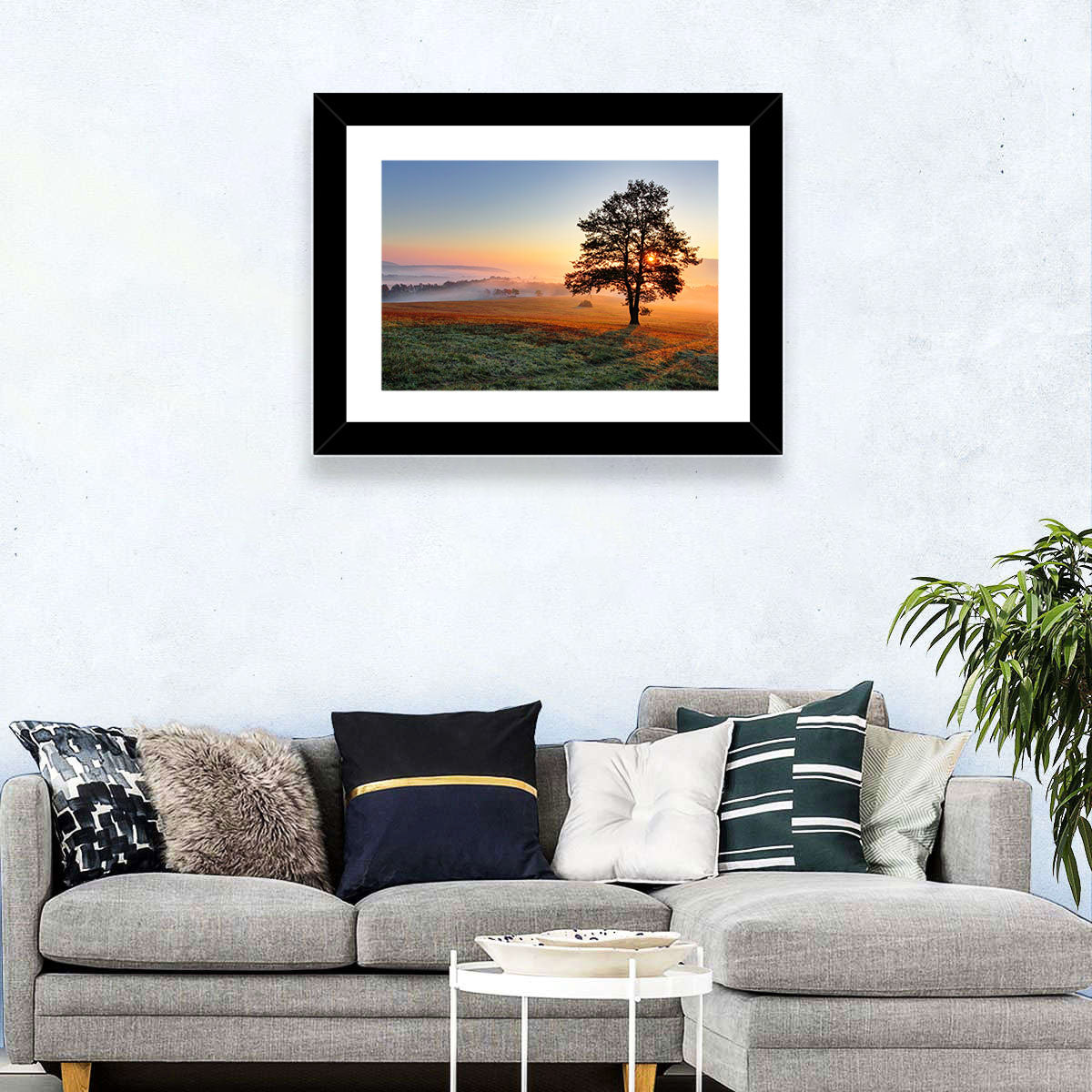 Misty Meadow Sunrise with Lone Tree Wall Art in a room, landscape