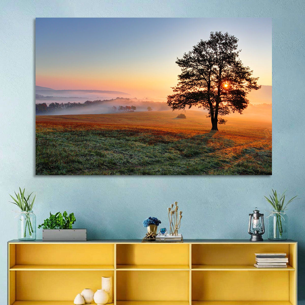 Misty Meadow Sunrise with Lone Tree Wall Art in a room, landscape
