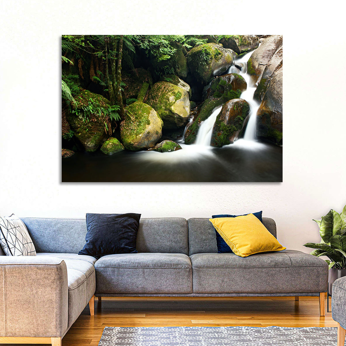 Rainforest Waterfall with Moss Covered Boulders Wall Art in a room, landscape