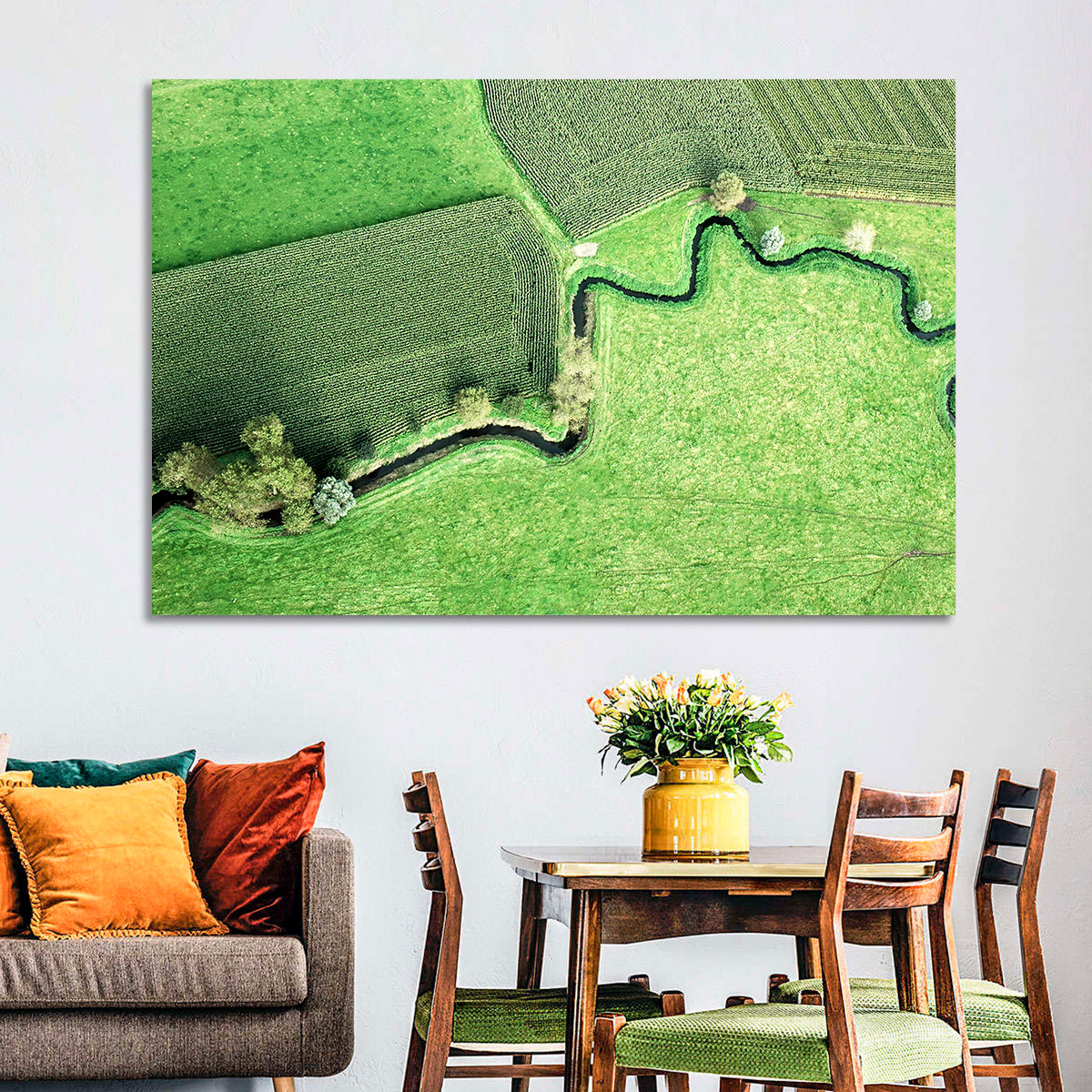 Meandering Stream Over Farmland Wall Art in a room, landscape