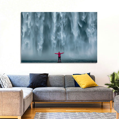 Skogafoss Waterfall with Figure in Pink Wall Art