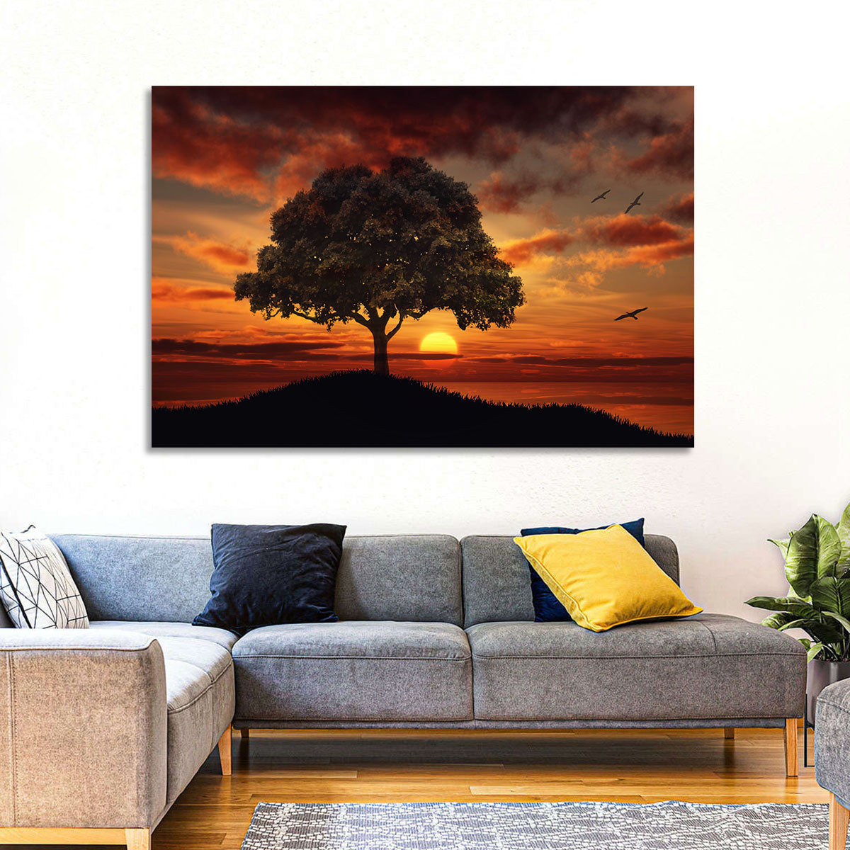 Lone Tree at Sunset with Birds Wall Art in a room, landscape