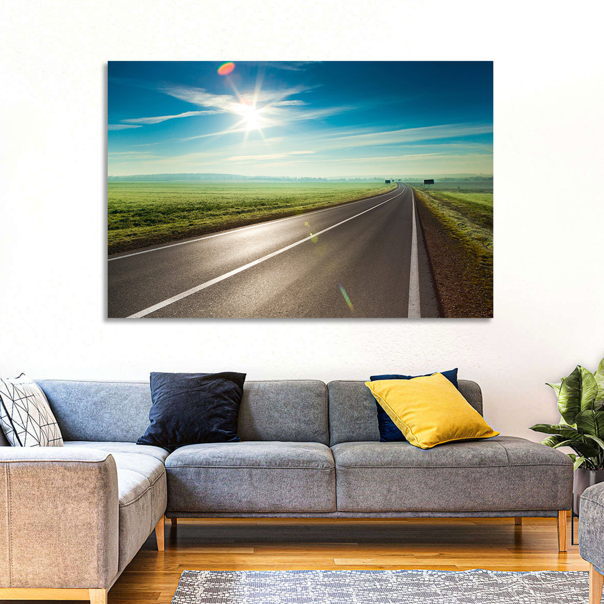 Sunlit Road Through Green Field Wall Art