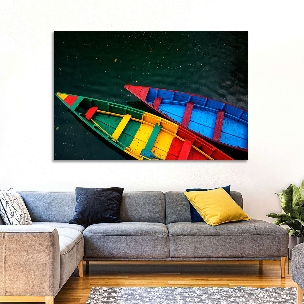 Two Colorful Boats Over Rippling Water Wall Art in a room, landscape