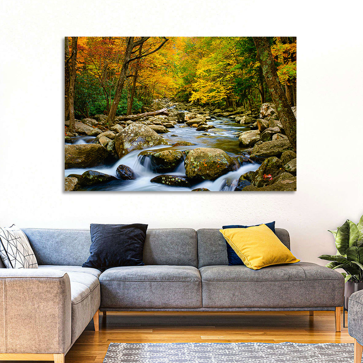 Autumn Stream Through Forest Wall Art in a room, landscape