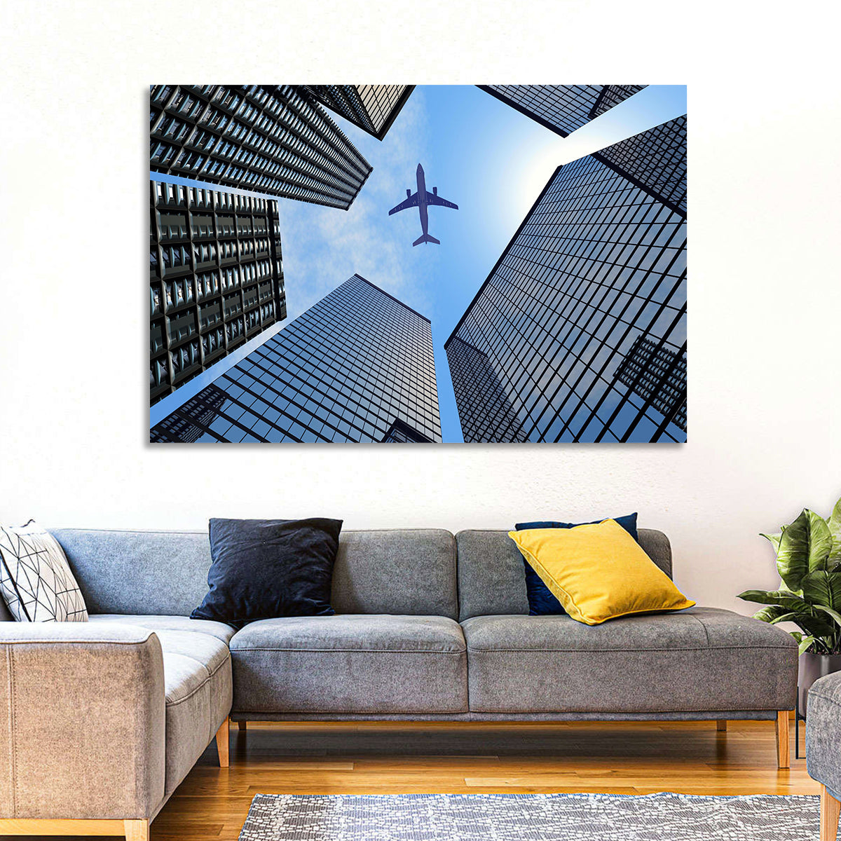 Airplane Above Skyscrapers Wall Art in a room, landscape