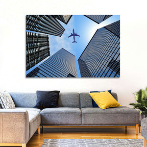 Airplane Above Skyscrapers Wall Art